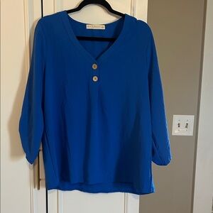 Elegant Blue V-Neck Blouse with Button Detail